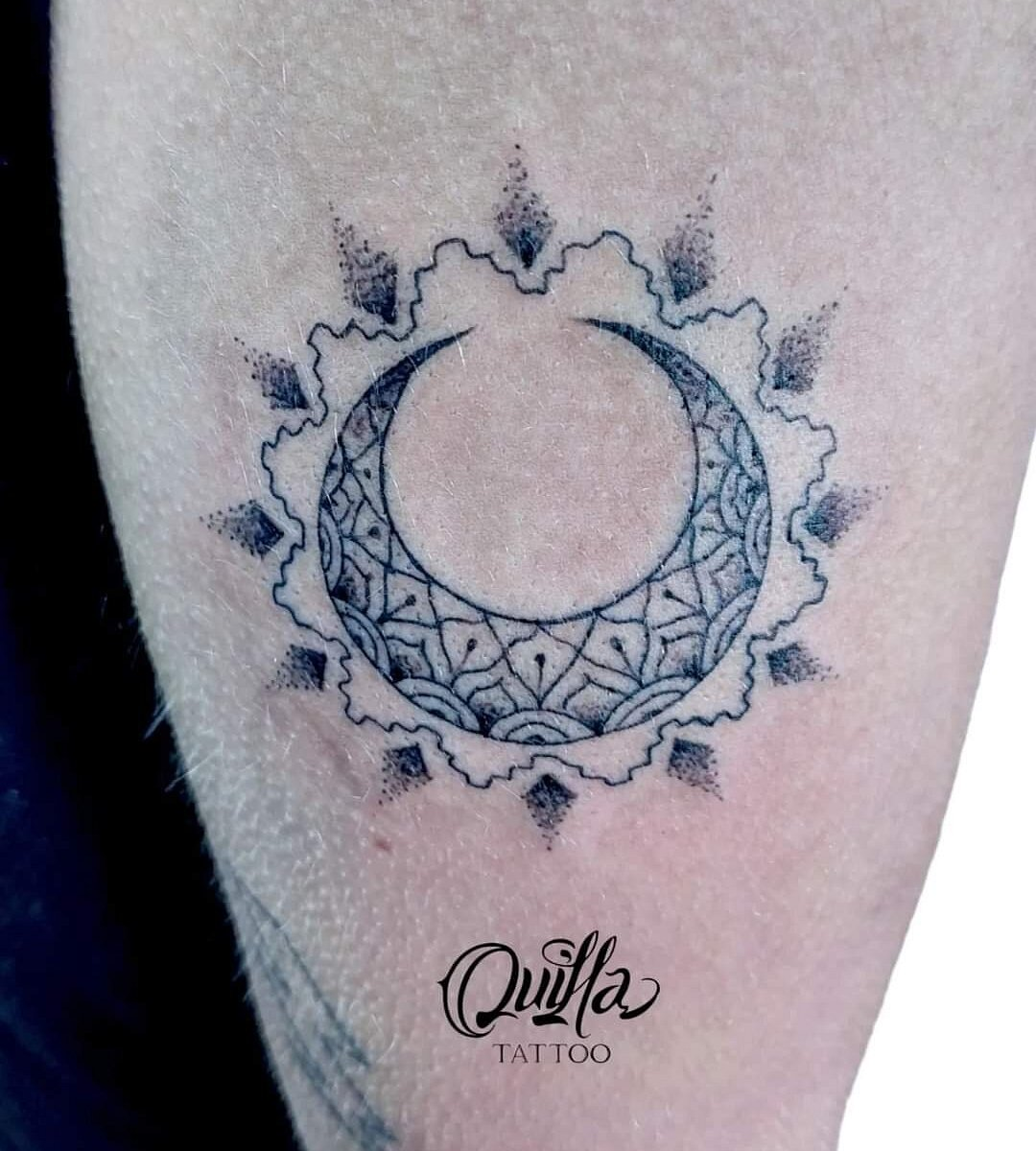 Fine line moon tattoo by Quilla Tattoo Cusco - dotwork crescent moon with ornamental details